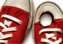 shoe with bullet hole